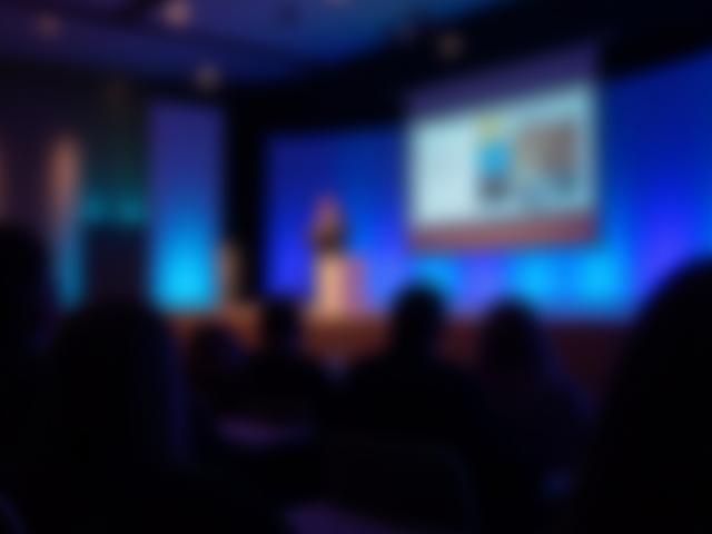Capturing a key moment with a speaker at a conference
